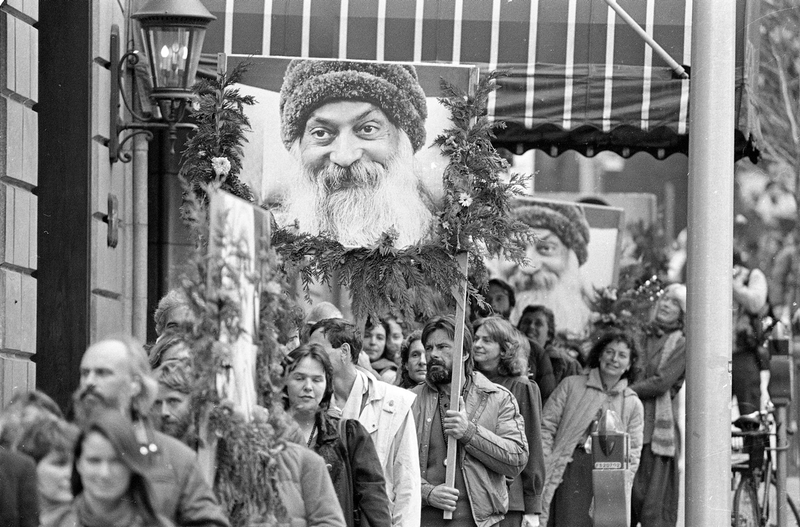 About 250 Rajneeshees march through downtown Portland on November 1, 1985 to protest the incarceration of their leader (AP Photo/Jack Smith)